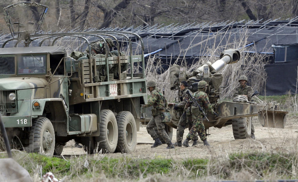 FILE - South Korean soldiers prepare 155 mm howitzers during their military exercise in the border city between two Koreas, Paju, north of Seoul, South Korea, on April 18, 2013. The U.S. will buy 100,000 rounds of howitzer artillery from South Korean manufacturers to provide to Ukraine, a U.S. official said Thursday, Nov. 10, 2022, in a deal the two governments have been working on for some time. (AP Photo/Lee Jin-man, File)