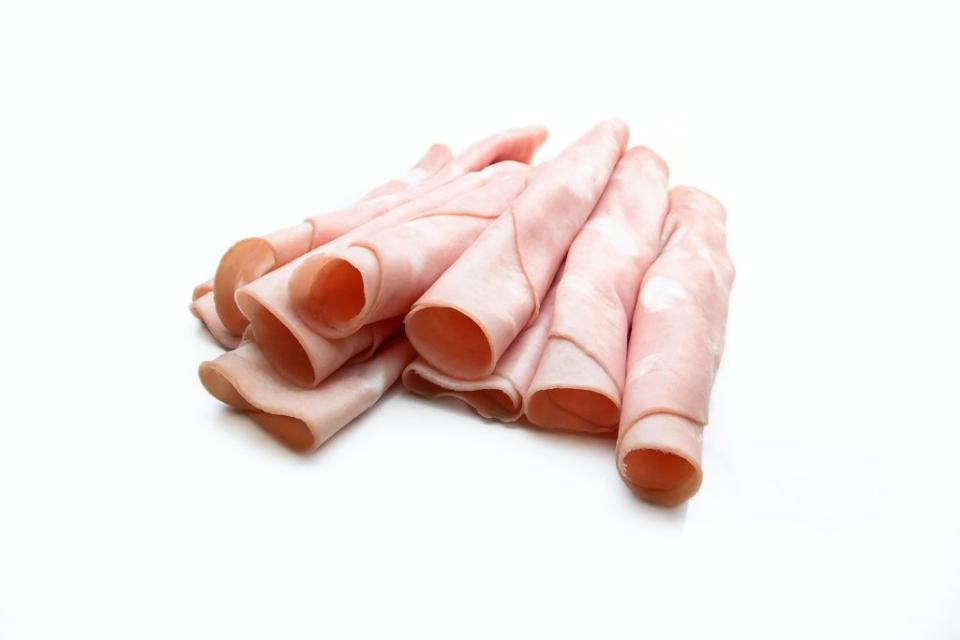 Sliced ham rolled up