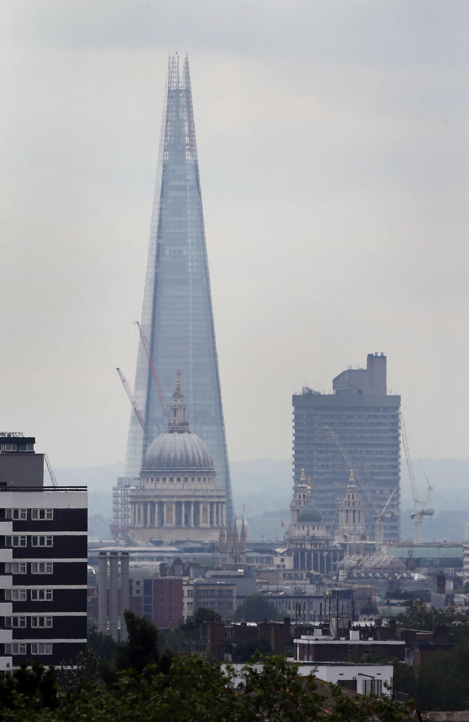 The Shard towers over St Paul's Cathedral in this view from Parliament Hill on July 5, 2012 (Photo by Peter Macdiarmid/Getty Images)