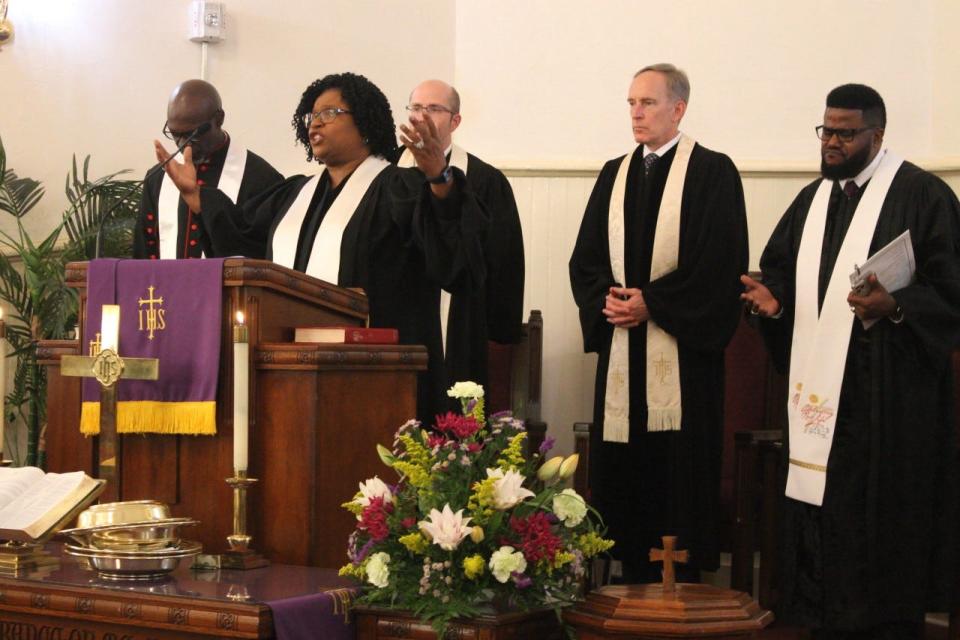 Pastor Mary L. Mitchell of Bartley Temple United Methodist Church leads the benediction during the Sunday morning worship service at Mount Pleasant United Methodist Church.
(Photo: Photo by Voleer Thomas/For The Guardian)