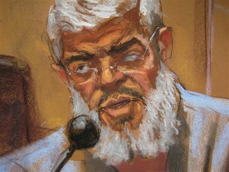 Abu Hamza al-Masri, the radical Islamist cleric facing U.S. terrorism charges, replies to questions from his defense lawyer Joshua Dratel (unseen) in Manhattan federal court in New York in this artist's sketch May 12, 2014. REUTERS/Jane Rosenberg
