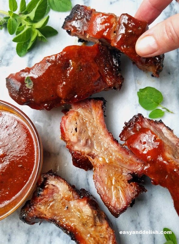 <p>Easy and Delish</p><p>Well-seasoned Chipotle BBQ Pork Ribs, grilled to perfection, and brushed with a tangy, sweet, and spicy barbecue sauce. They are finger-licking delicious and a real summer hit! <strong>Get the Recipe: <a href="https://www.easyanddelish.com/chipotle-barbecue-pork-ribs/" rel="nofollow noopener" target="_blank" data-ylk="slk:Chipotle Barbecue Pork Ribs;elm:context_link;itc:0;sec:content-canvas" class="link rapid-noclick-resp">Chipotle Barbecue Pork Ribs</a></strong></p>