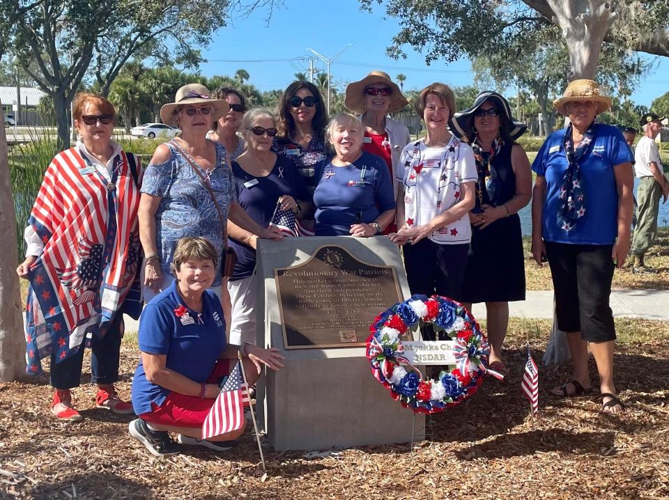 The Myakka Chapter of the Daughters of the American Revolution honor Veterans Day at the Revolutionary War Patriots marker at Patriots Park in Venice. The Myakka Chapter presented the marker to the city of Venice last year. The chapter includes Ann Hardin, Ann Horton, Cindy Smith, Cindy Eaton, Holly Findley, Samira Easton, Darlene Bigos, Sandy Adams, Judy Lindauer, Karla Olson, and Jackie Urschel. Visit myakkadar.com.