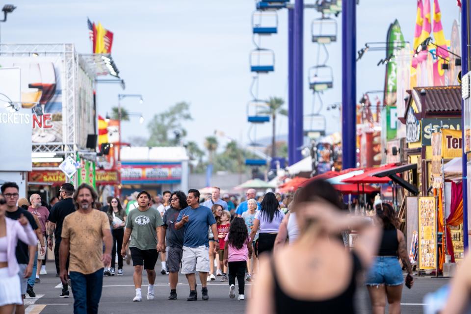 People attend the Arizona State Fair in Phoenix on Sept. 22, 2023.