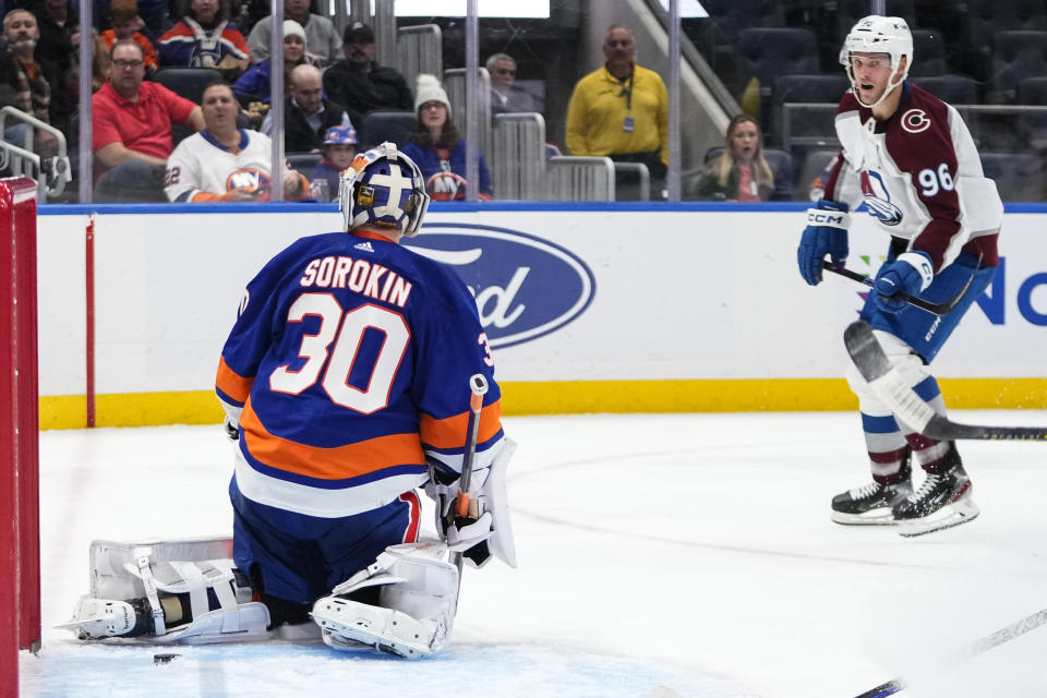 Colorado Avalanche's Mikko Rantanen (96) watches the puck he shot past New York Islanders goaltender Ilya Sorokin (30) for a goal during the third period of an NHL hockey game Tuesday, Oct. 24, 2023, in Elmont, N.Y. (AP Photo/Frank Franklin II)