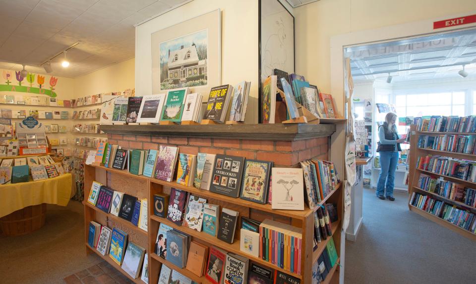 The hearth of the old home housing Brewster Book Store is the display space for books on Cape Cod. The popular store is getting an addition, scheduled to be completed this spring.