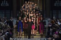 Designer Julien Macdonald (C) reacts at the end of his Autumn/Winter 2015 collection show at London Fashion Week in London February 21, 2015. REUTERS/Toby Melville