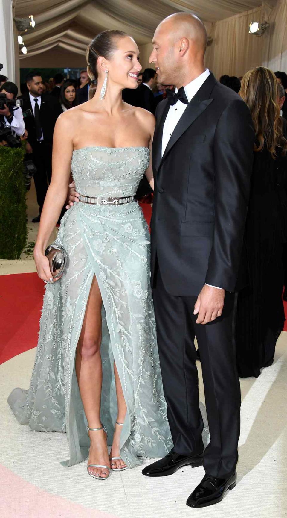 Hannah Davis (L) and Derek Jeter attend the "Manus x Machina: Fashion In An Age Of Technology" Costume Institute Gala at Metropolitan Museum of Art on May 2, 2016 in New York City