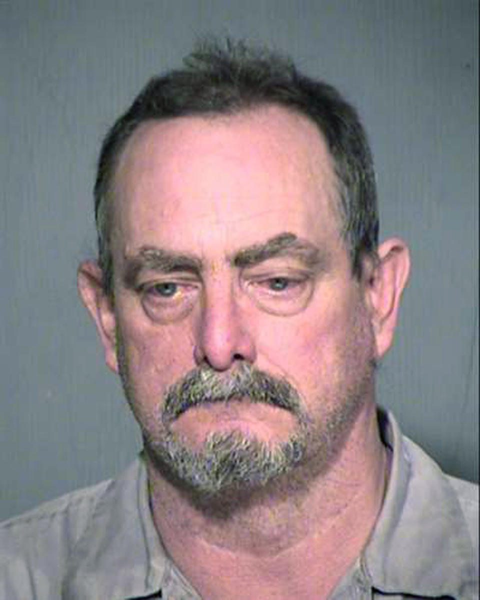 This undated photo released by the Maricopa County Sheriff's Office shows Daniel Davitt. Authorities say Davitt, a Phoenix area jail officer who was comatose after being attacked by an inmate, has died. Maricopa County Sheriff Paul Penzone said 59-year-old Daniel Davitt attacked Officer Gene Lee without provocation Tuesday, Oct. 29, 2019. He said Lee was grabbed by the throat from behind and knocked to the ground. Penzone said Lee's head hit the cement floor and he never regained consciousness. Davitt faces sex crime charges involving children and is representing himself. (Maricopa County Sheriff's Office via AP)