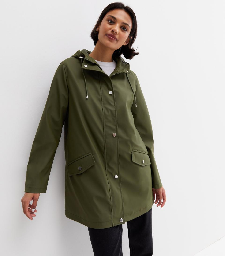 This stylish raincoat looks great done up or left open. (New Look)