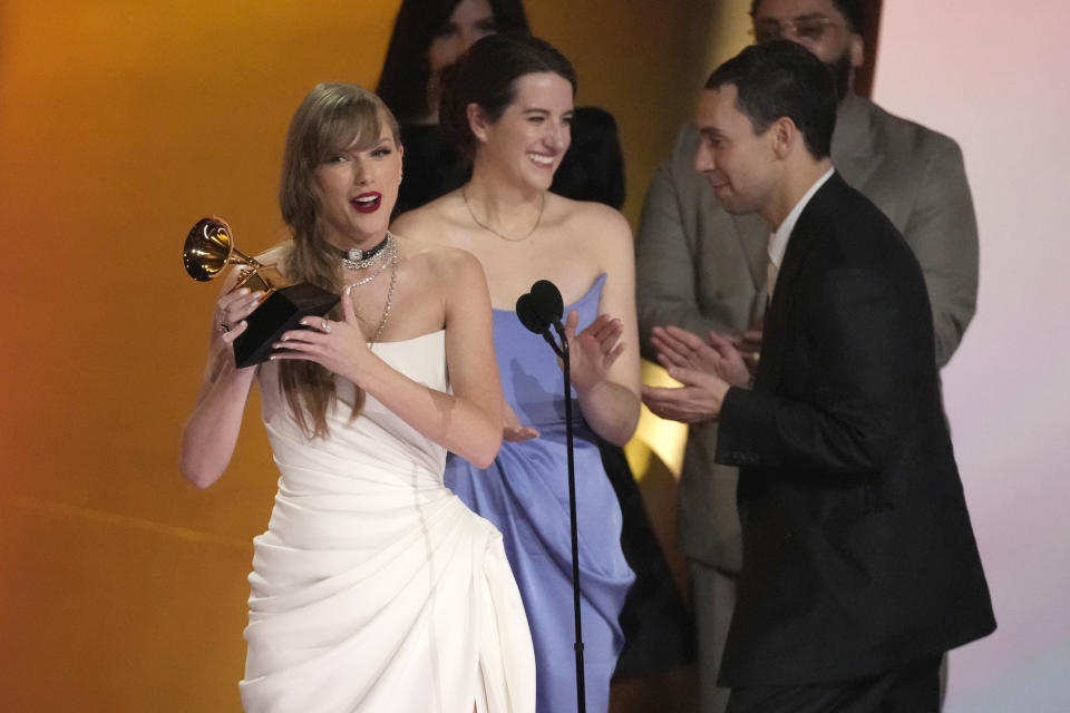 Taylor Swift accepts the award for album of the year for "MIdnights" during the 66th annual Grammy Awards on Sunday, Feb. 4, 2024, in Los Angeles. (AP Photo/Chris Pizzello)