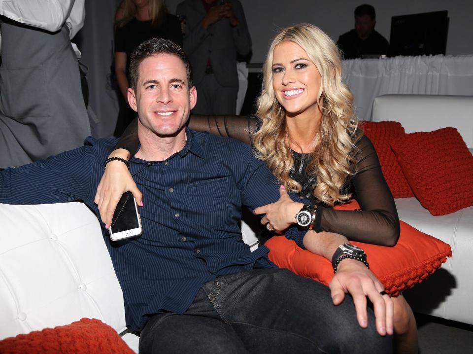 Tarek El Moussa and Christina Haack pose for a photo.