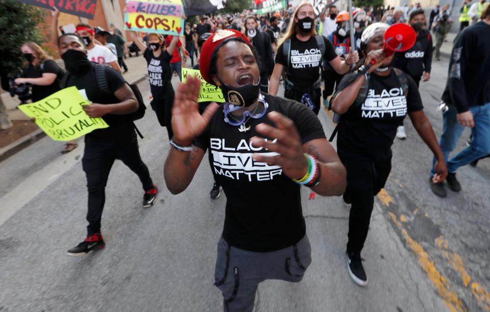 Protesters marched down Guthrie towards Second Street Saturday night in downtown Louisville. 9.26.20.