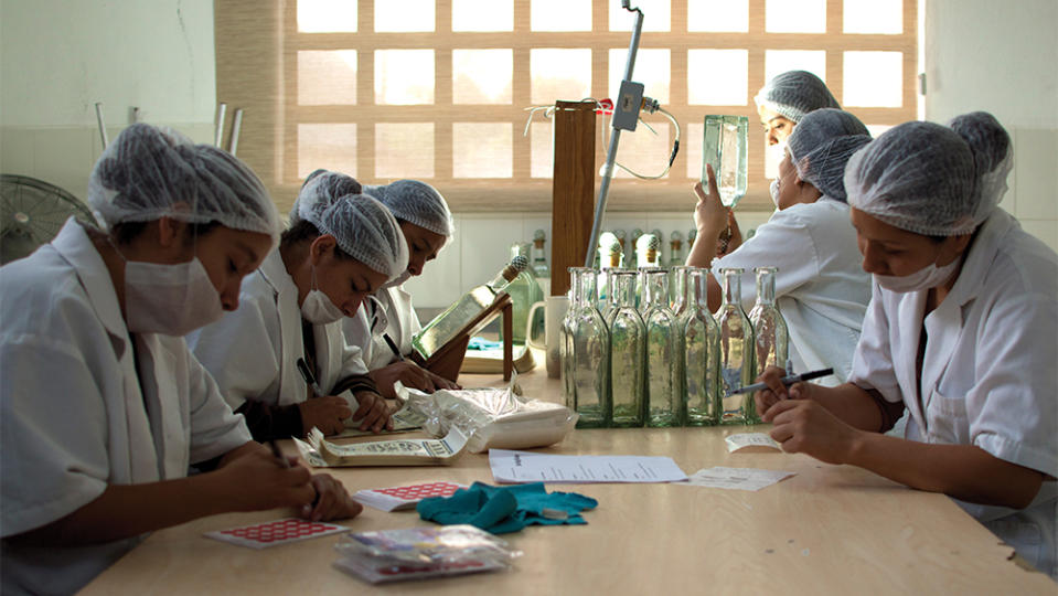 Workers bottling Fortaleza.