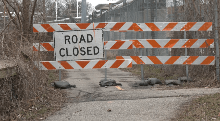 A portion of the Lansing River Trail has been shutdown until clean-up crews can remove creosote contamination. (WLNS)