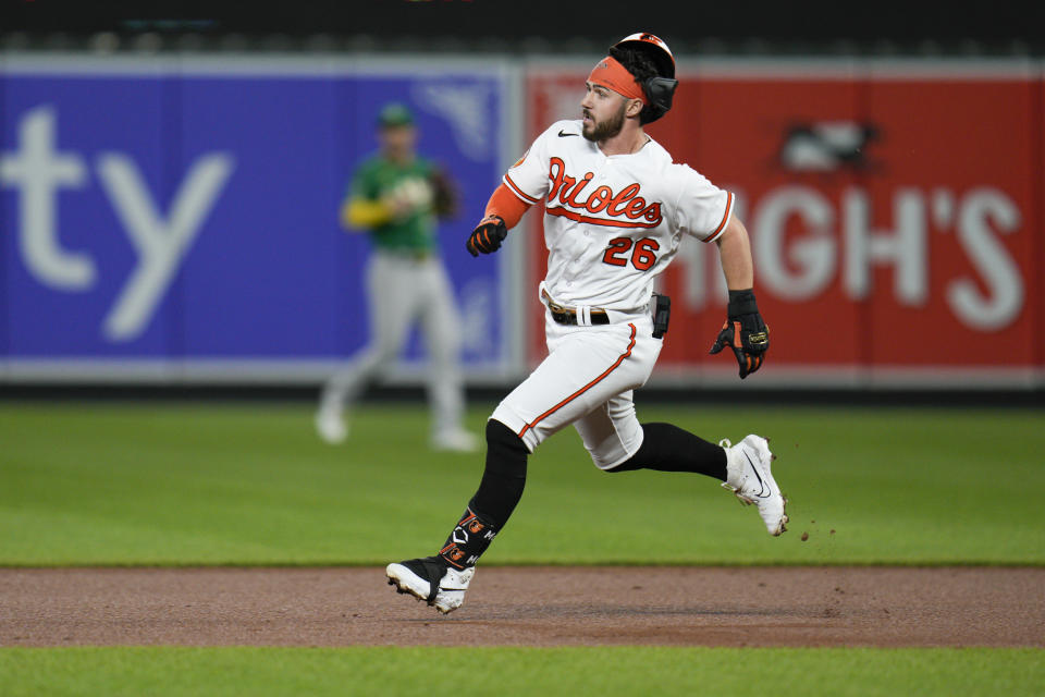 Baltimore Orioles' Ryan McKenna runs to second with a double against the Oakland Athletics during the fifth inning of a baseball game Wednesday, April 12, 2023, in Baltimore. The Athletics won 8-4. (AP Photo/Jess Rapfogel)
