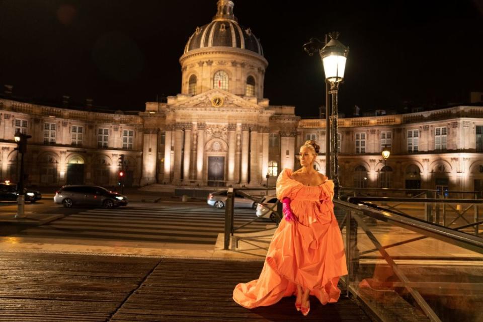 Carrie back in Paris for the season finale of “And Just Like That,” wearing a Valentino couture gown as dramatic as the one she wore in the original series finale. - Credit: HBO Max