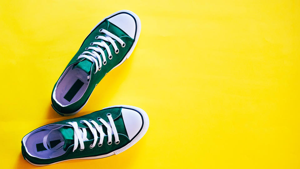 pair of sneakers on yellow backdrop: genius uses for dryer shoots