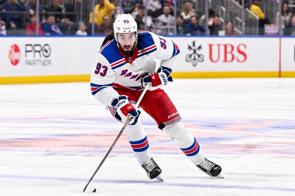 Apr 9, 2024; Elmont, New York, USA; New York Rangers center Mika Zibanejad (93) skates across the blue line against the New York Islanders during the third period at UBS Arena.