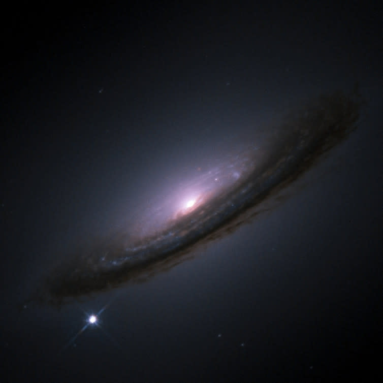 <span class="caption">SN 1994D (bright spot on the lower left), a type Ia supernova in the NGC 4526 galaxy.</span> <span class="attribution"><span class="source">NASA/ESA</span>, <a class="link " href="http://creativecommons.org/licenses/by-sa/4.0/" rel="nofollow noopener" target="_blank" data-ylk="slk:CC BY-SA;elm:context_link;itc:0;sec:content-canvas">CC BY-SA</a></span>