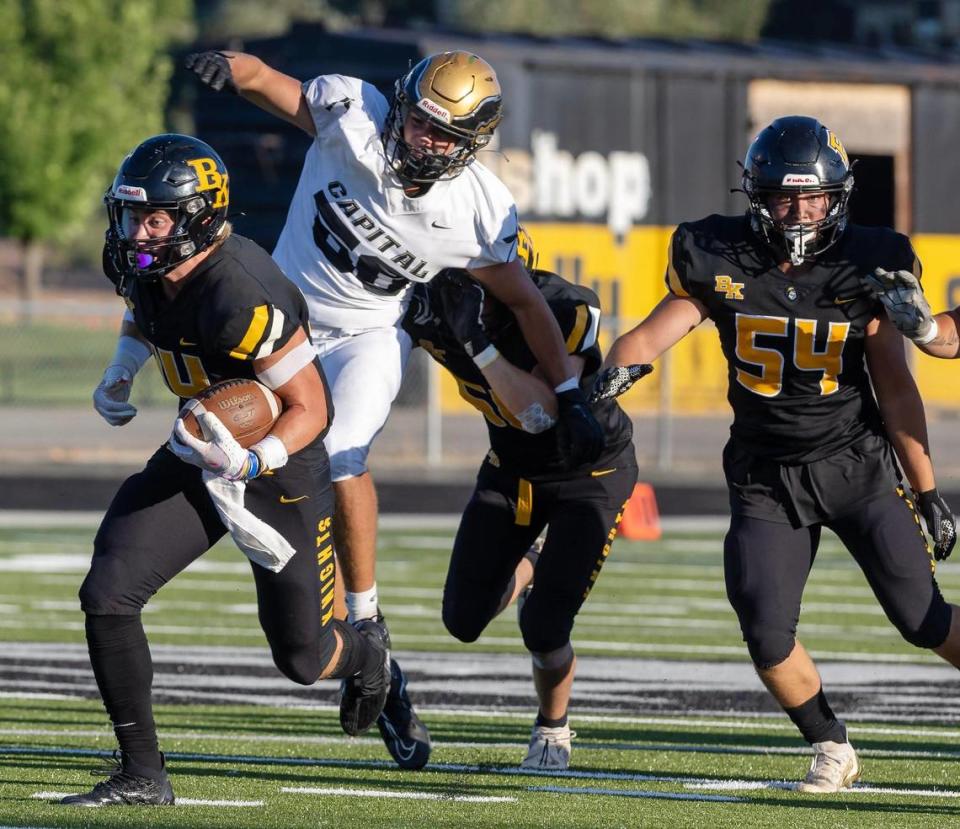 Bishop Kelly running back senior Peter Minnaert breaks free for the the end zone Friday against Capital.