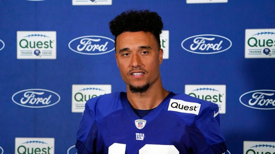 New York Giants wide receiver Isaiah Hodgins (18) talks to reporters after training camp in East Rutherford.