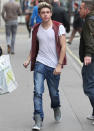 Niall doesn't let his hair down as he heads out and about in London in a casual jeans and sleeveless jersey-cardigan.