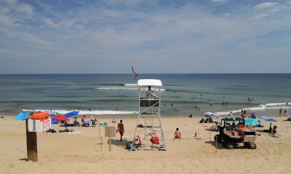 Lifeguards keep watch over Marconi Beach, one of the Cape Cod surf beaches where rip currents can develop.