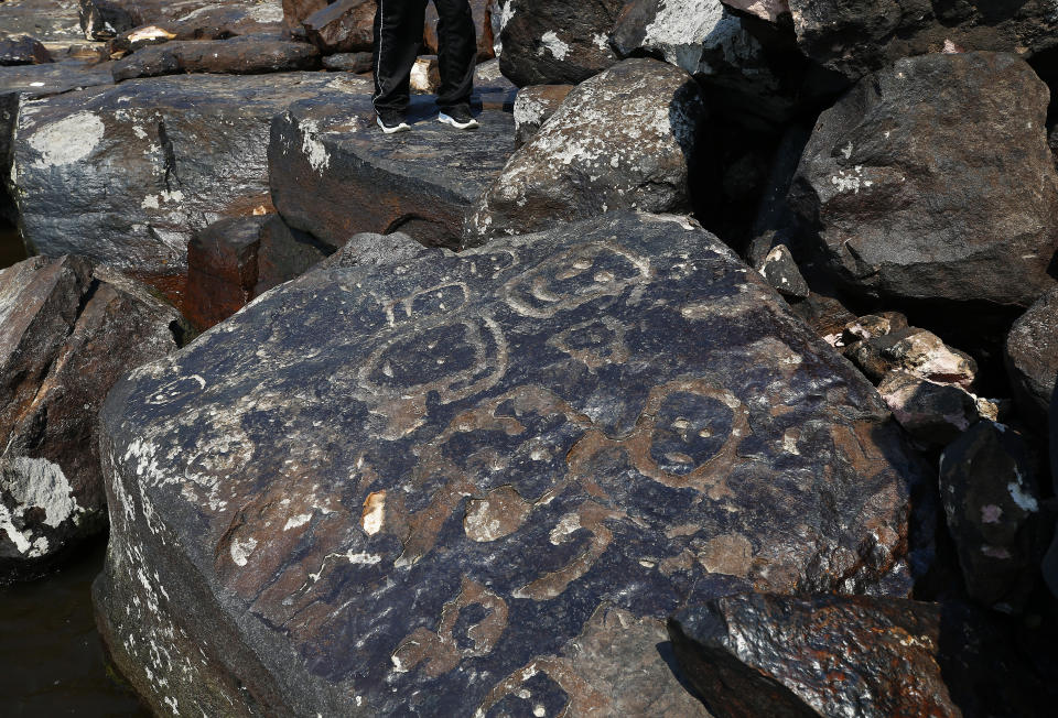 Rock paintings are seen at the Ponta das Lajes archaeological site, in the rural area of Manaus, Brazil, Saturday, Oct. 28, 2023. The archaeological site was exposed following a drought in the Negro River, unveiling rock paintings that, according to archaeologists, date back between 1,000 and 2,000 years. (AP Photo/Edmar Barros)