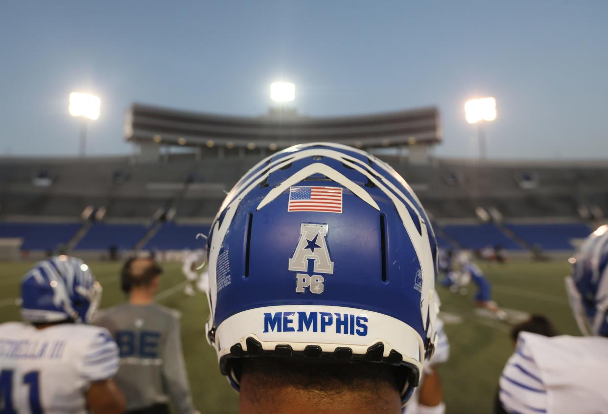 The Memphis Tigers take the field during the Friday Night Stripes spring football game at Liberty Bowl Memorial Stadium on Friday, April 22, 2022. 