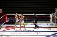 Muaythai boxers return to fight for the first time after temporary suspend due to the spread of the coronavirus disease (COVID-19) in Thailand