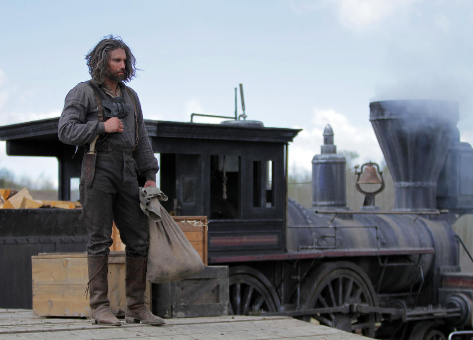 This image released by AMC shows Anson Mount as Cullen Bohannon in a scene from "Hell On Wheels," airing Sundays at 9 p.m. EST on AMC. Returning for its second season, AMC's "Hell on Wheels" focuses on Cullen Bohannon, a former Confederate soldier who after the war heads west to Nebraska to work on the transcontinental railroad and, he hopes, avenge the death of his wife at the hands of someone likely to be found at the Union Pacific construction camp. (AP Photo/AMC, Michelle Faye)