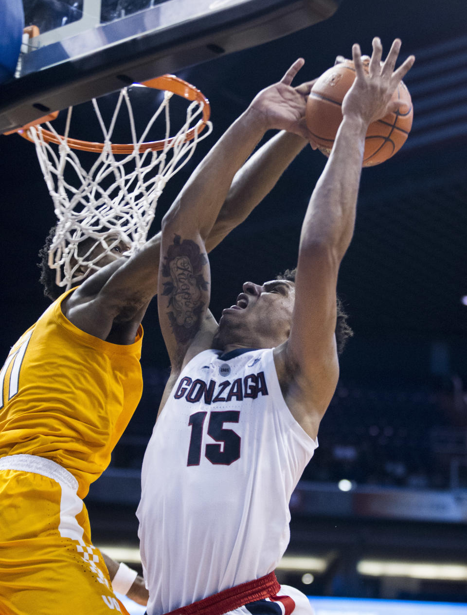 Gonzaga's Brandon Clarke (15) is rejected by Tennessee's Kyle Alexander (11) during the first half of an NCAA college basketball game Sunday, Dec. 9, 2018, in Phoenix. (AP Photo/Darryl Webb)