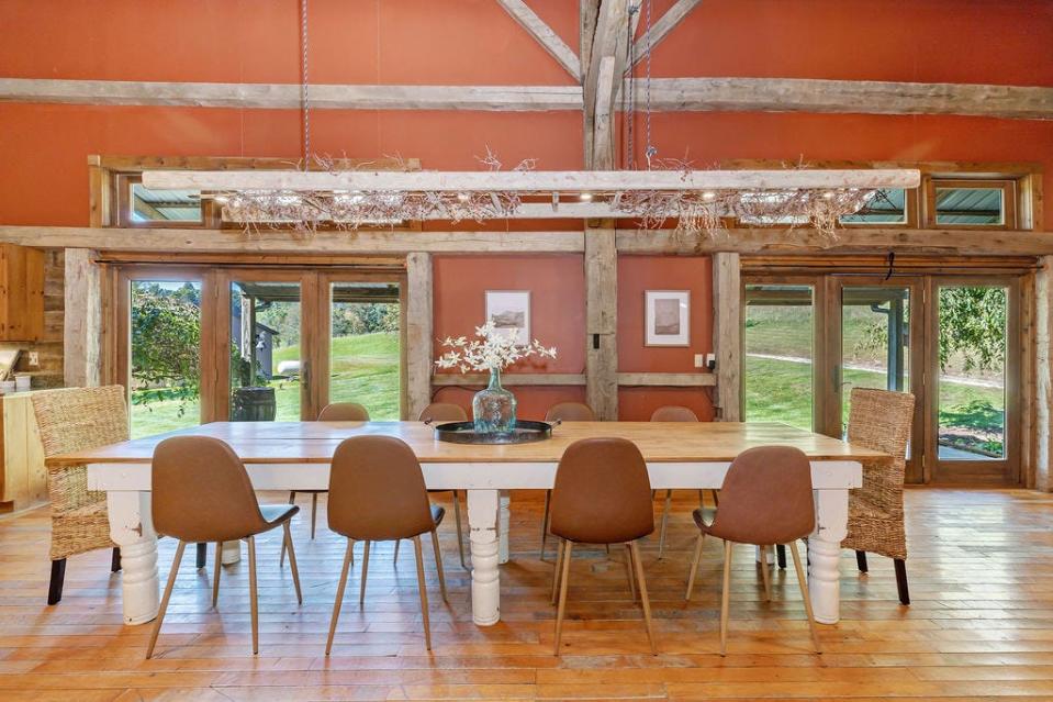 A light fixture fashioned out of an old ladder hangs above the dining table in a Licking County home for sale.