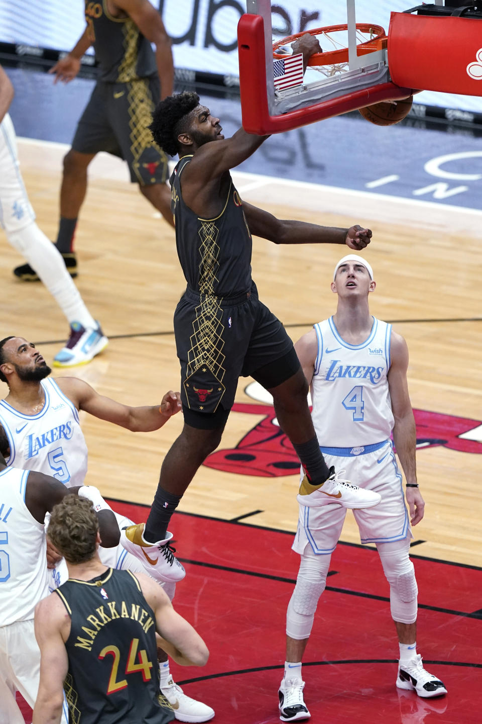 Chicago Bulls forward Patrick Williams dunks against the Los Angeles Lakers during the first half of an NBA basketball game in Chicago, Saturday, Jan. 23, 2021. (AP Photo/Nam Y. Huh)