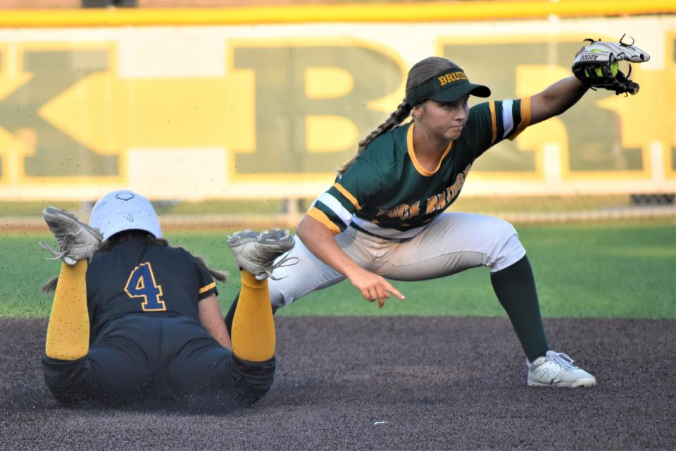 Rock Bridge's Sophia Schupp (20) calmly makes a play at second base to force Battle's Jacei Roland (4) out in the Bruins' 6-1 win over the Spartans on Sept. 6.