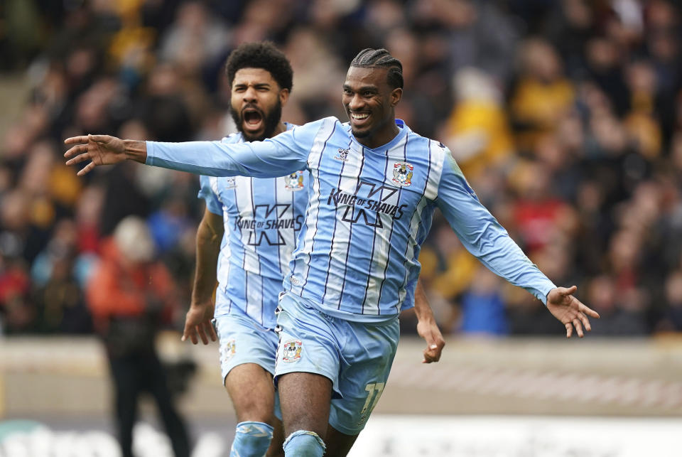 Coventry City's Haji Wright celebrates scoring his side's third goal of the game, during the English FA Cup quarter final match soccer match between Wolverhampton and Coventry City, at the Molineux, Wolverhampton, England, Saturday, March 16, 2024. (Mike Egerton/PA via AP)