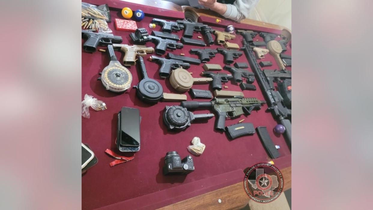 <div>Guns and items seized from a home in Georgia where 20 gang members were arrested.</div> <strong>(Cedar Park Police Department)</strong>