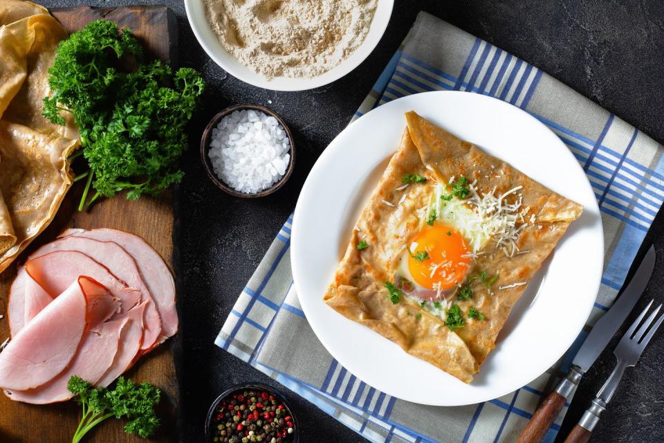 breton crepe, savory buckwheat galettes bretonnes with fried egg, cheese, ham