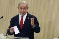Israeli Prime Minister Benjamin Netanyahu gestures as he speaks. during a press conference after a meeting with Cypriot president Nikos Christodoulides and Greek Prime Minister Kyriakos Mitsotakis at the presidential palace in Nicosia, Cyprus, on Monday, Sept. 4, 2023. Israel's prime minister is floating the idea of building infrastructure projects such as a fiber optic cable linking countries in Asia and the Arabian Peninsula with Europe through Israel and Cyprus. (AP Photo/Petros Karadjias, Pool)