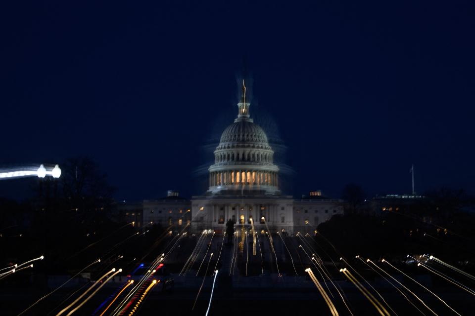 This long exposure zoomed picture shows the US Capitol on March 1, 2022 in Washington, DC, ahead of US President Joe Biden's State of the Union address. - Embroiled in the most severe US-Russia crisis since the Cold War, President Joe Biden will take on a no less difficult domestic challenge during his State of the Union address: restoring Americans' optimism.