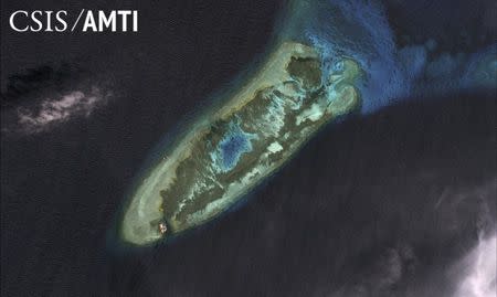 Fiery Cross Reef is shown in this handout satellite image dated January 22, 2006 and provided by CSIS Asia Maritime Transparency Initiative/Digital Globe September 14, 2015. REUTERS/CSIS Asia Maritime Transparency Initiative/Digital Globe/Handout via Reuters