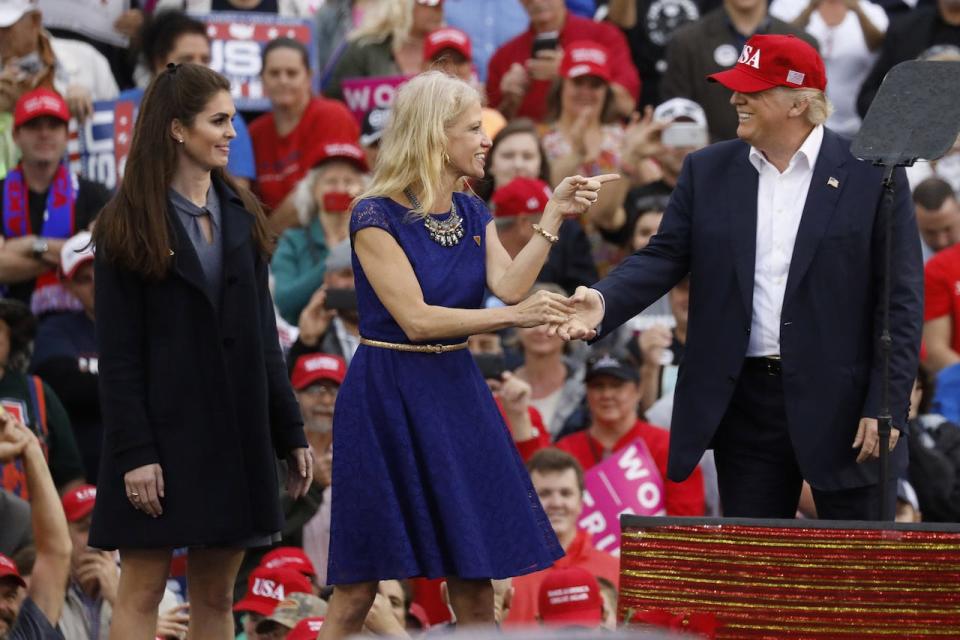 Trump with Kellyanne Conway and Hope Hicks at a campaign event