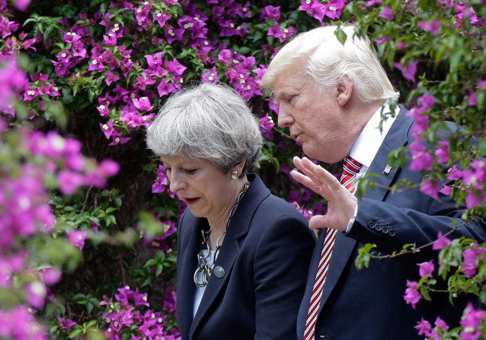 <p>President Donald Trump, right, talks with British Prime Minister Theresa May in Taormina, Italy, Friday, May 26, 2017. Leaders of the G7 meet Friday and Saturday, including newcomers Emmanuel Macron of France and Theresa May of Britain in an effort to forge a new dynamic after a year of global political turmoil amid a rise in nationalism. (Photo: Luca Bruno/AP) </p>