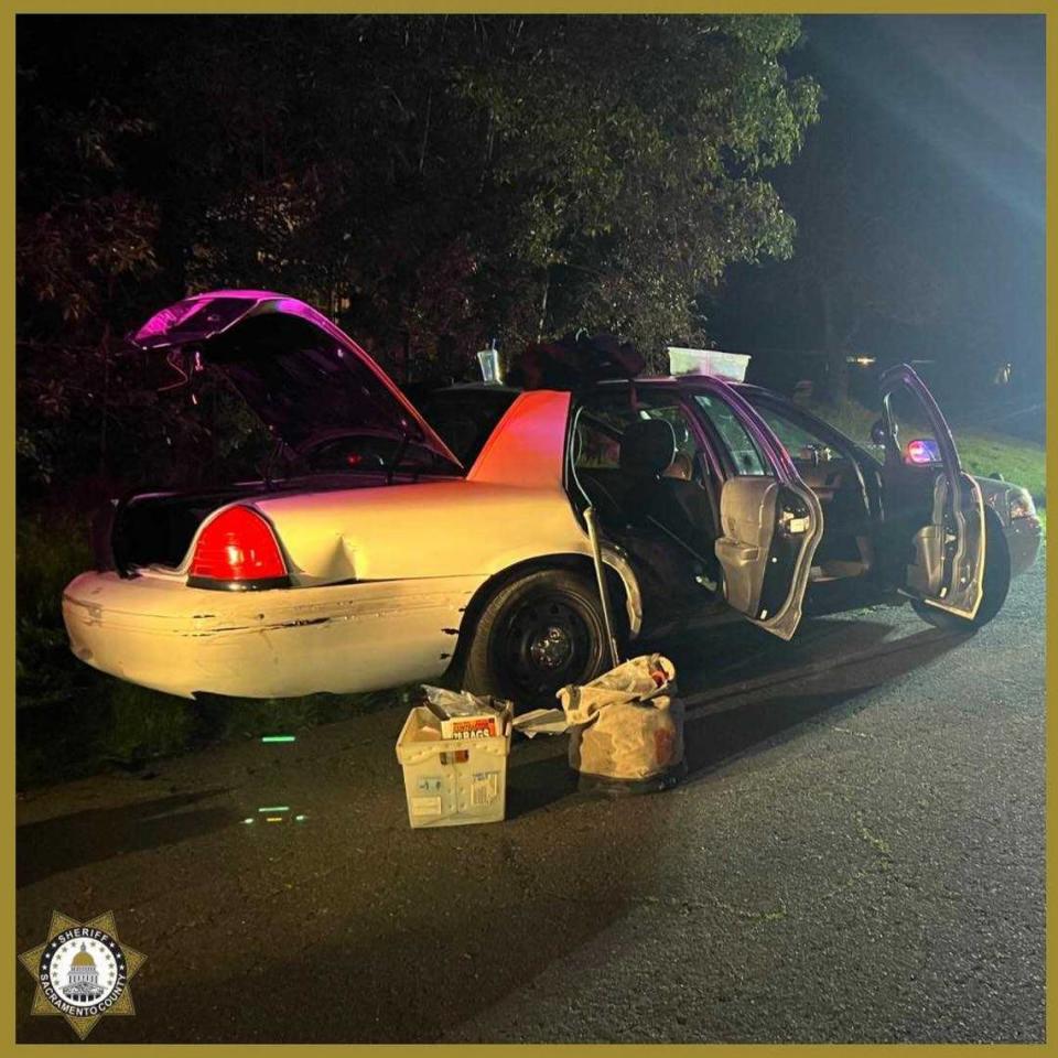 A suspect accused of stealing a white Ford Crown Victoria, pictured, was arrested Saturday in North Highlands and found with sheriff’s deputies uniforms.