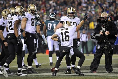 Jan 4, 2014; Philadelphia, PA, USA; New Orleans Saints wide receiver Lance Moore (16) celebrates a touchdown catch against the Philadelphia Eagles during the second half of the 2013 NFC wild card playoff football game at Lincoln Financial Field. Mandatory Credit: Joe Camporeale-USA TODAY Sports