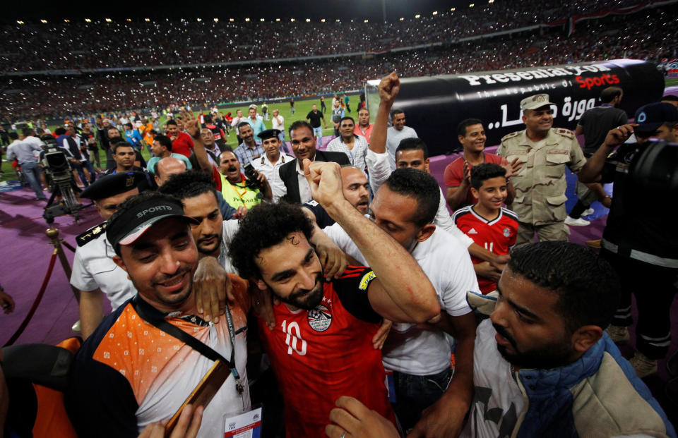 Egypt’s Mohamed Salah, teammates and fans celebrate World Cup qualification. (Reuters)