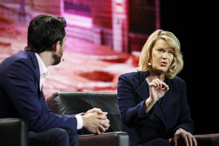 Miami, florida - april 8:  u. S. Sen cynthia lummis (r-wy) (r) gestures as she speaks during the bitcoin 2022 conference, next to marco santori, chief legal officer of kraken digital asset exchange, at miami beach convention center on april 8, 2022 in miami, florida. The worlds largest bitcoin conference runs from april 6-9, expecting over 30,000 people in attendance and over 7 million live stream viewers worldwide. (photo by marco bello/getty images)