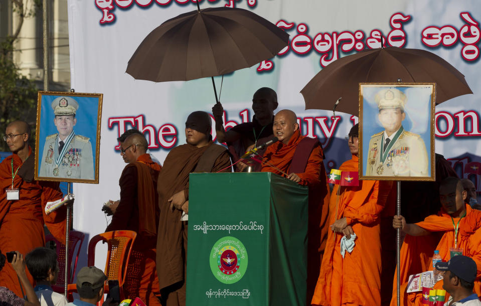 Buddhist monk and anti-Muslim community leader Wirathu speaks during a pro-military rally Sunday, Oct. 14, 2018, in front of city hall in Yangon, Myanmar. Several thousand pro-military and nationalist demonstrators marched through Yangon on Sunday voicing their support for Myanmar's armed forces and government while condemning foreign involvement in the country's affairs. (AP Photo/Thein Zaw)