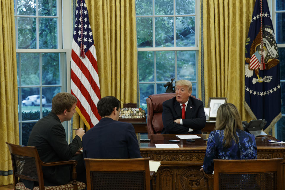 President Donald Trump speaks during an interview with The Associated Press in the Oval Office of the White House, Tuesday, Oct. 16, 2018, in Washington. (AP Photo/Evan Vucci)